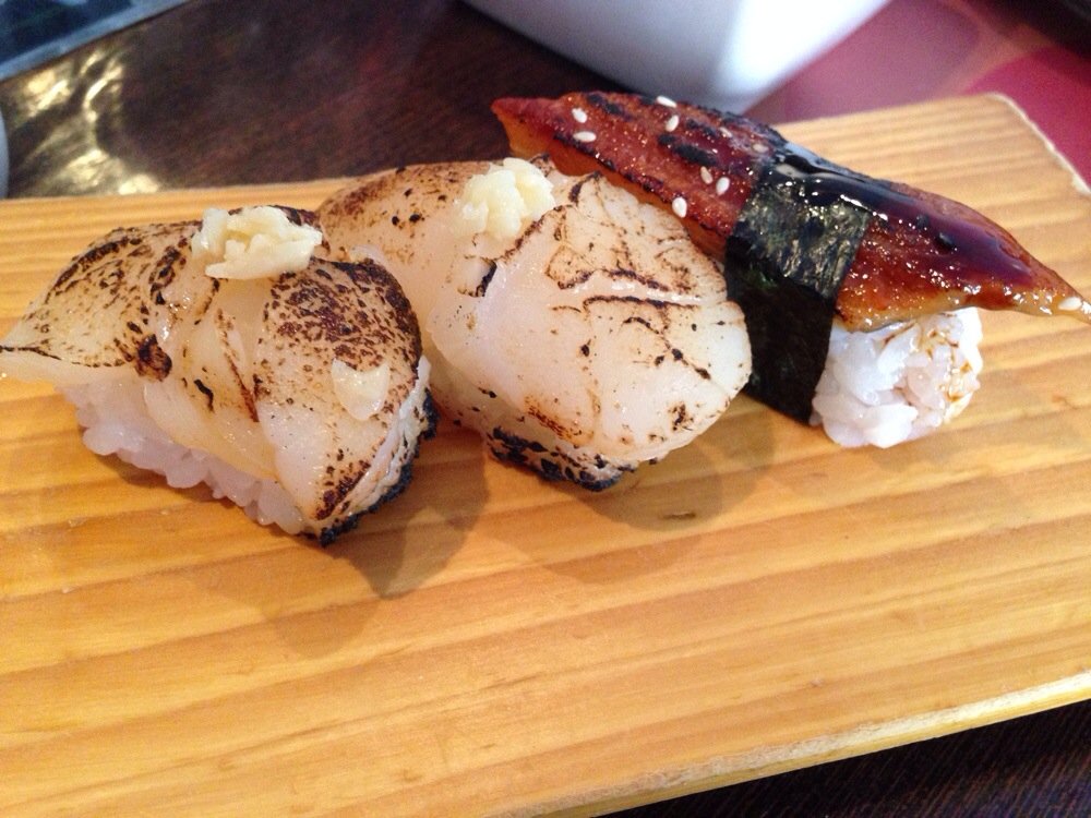Sushi sampler on a wooden dish