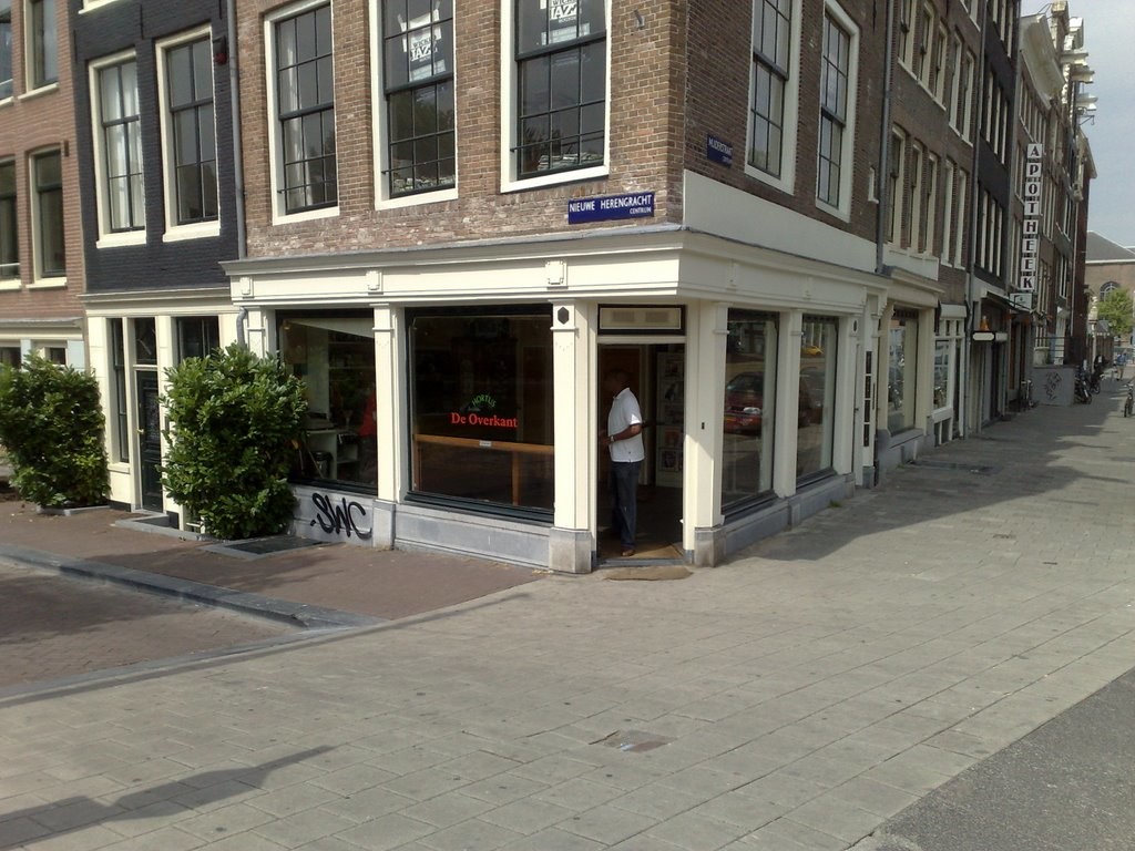 Picture by Hackepapz on Panoramio Entrance of the cannabis club near a garden and a pharmacy in Amsterdam